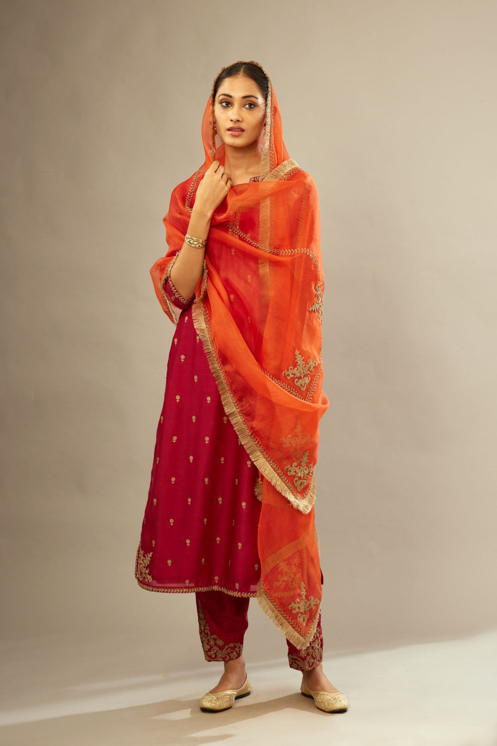 Fuchsia silk chanderi straight kurta set with gold dori embroidery, detailed with small aari embroidery buties all-over.