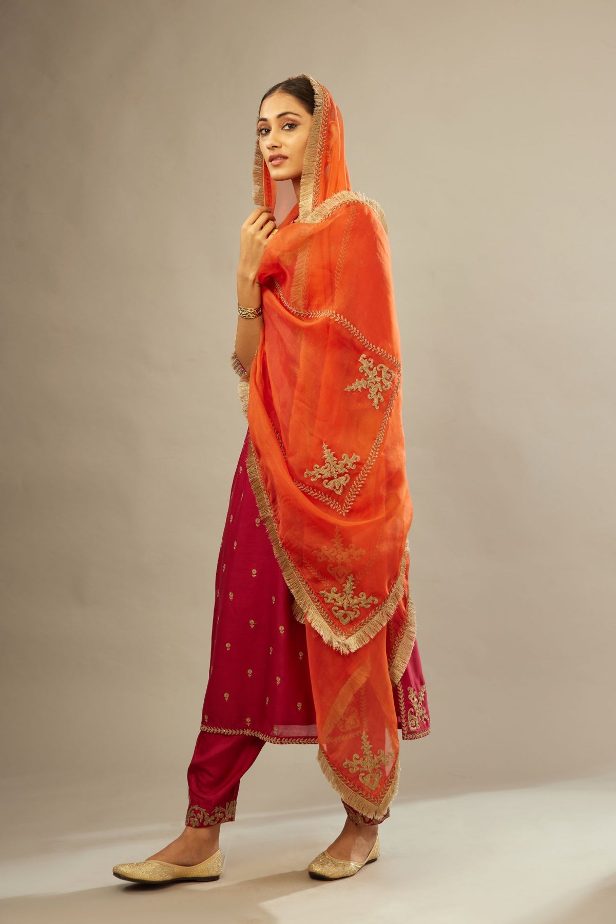 Fuchsia silk chanderi straight kurta set with gold dori embroidery, detailed with small aari embroidery buties all-over.