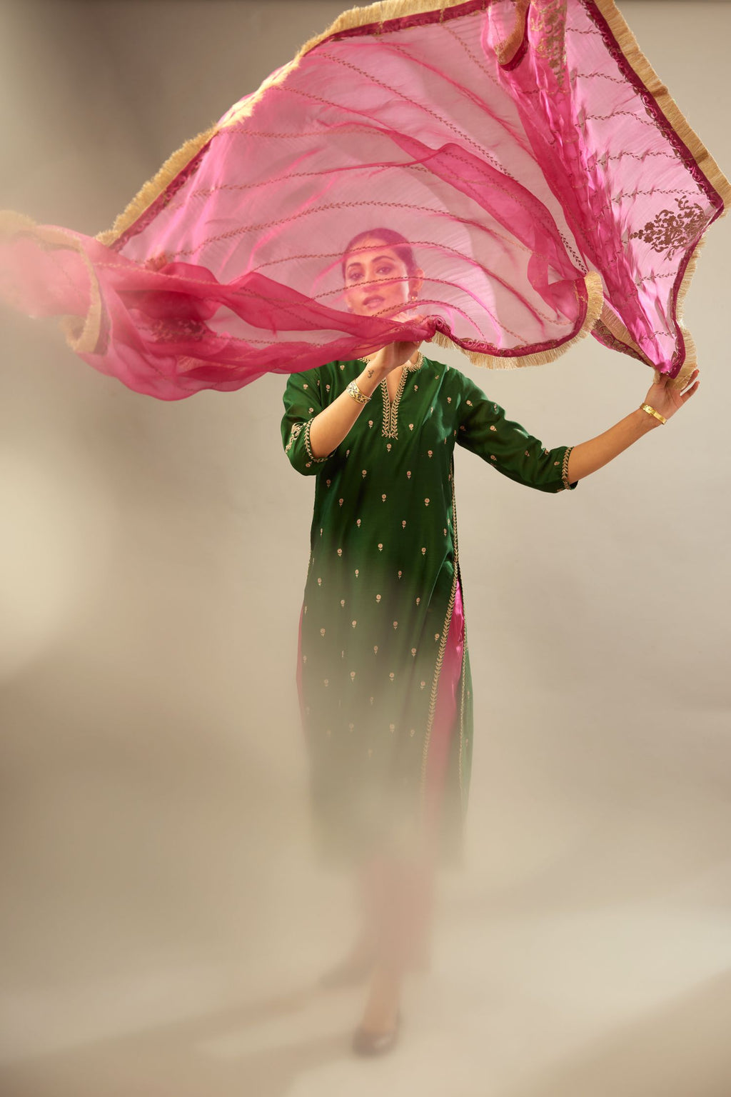 Green silk chanderi straight kurta set with gold dori embroidery, detailed with small aari embroidery buties all-over.