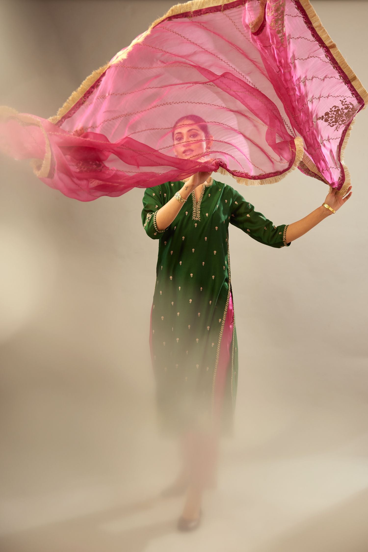 Green silk chanderi straight kurta set with gold dori embroidery, detailed with small aari embroidery buties all-over.