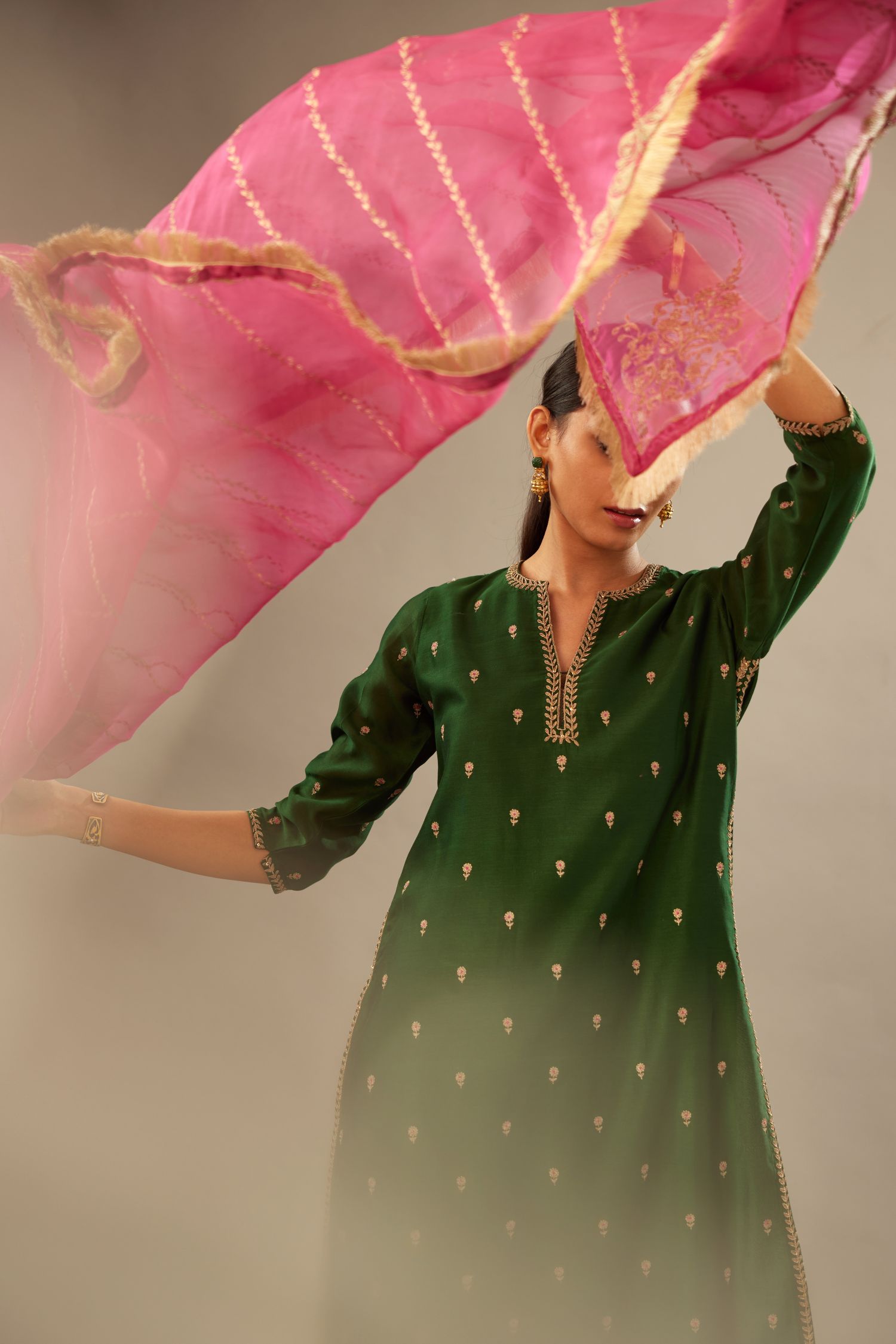 Green silk chanderi straight kurta set with gold dori embroidery, detailed with small aari embroidery buties all-over.