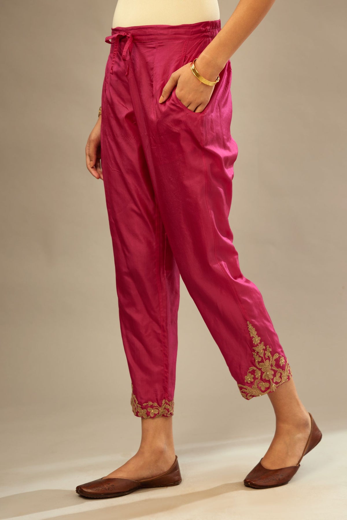 Jazzberry jam silk straight pants with dori embroidery at hem.
