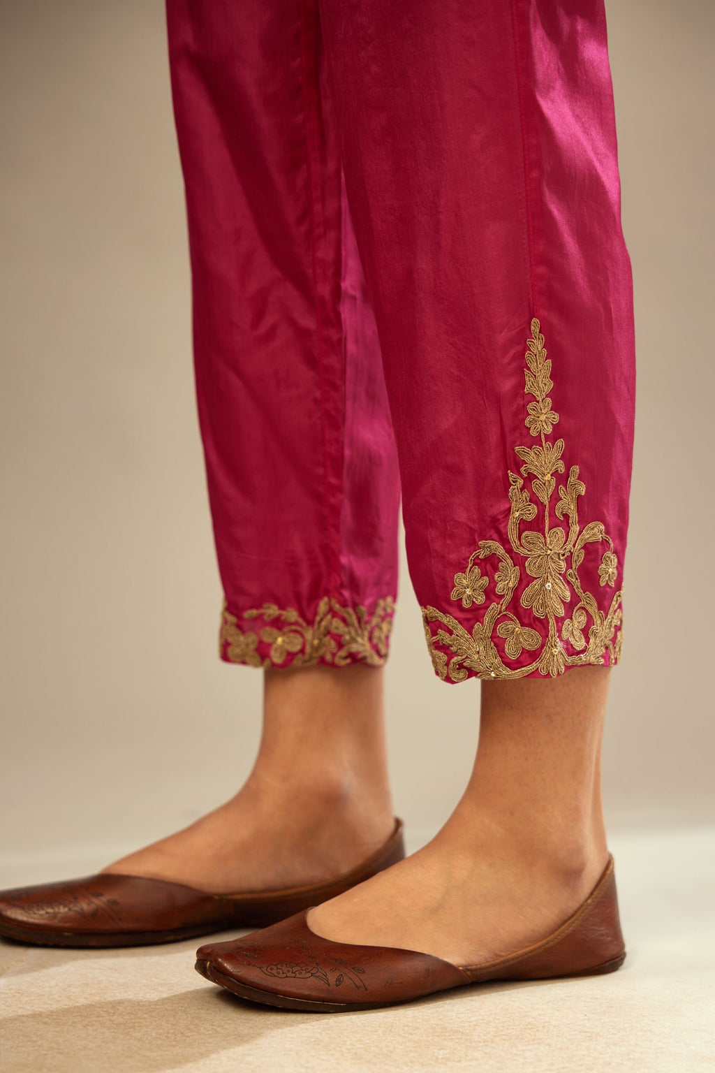 Jazzberry jam silk straight pants with dori embroidery at hem.