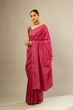 Jazzberry jam silk saree set with a broad border of hand embroidered geometrically aligned sequins and three horizontal bands at the pallu.