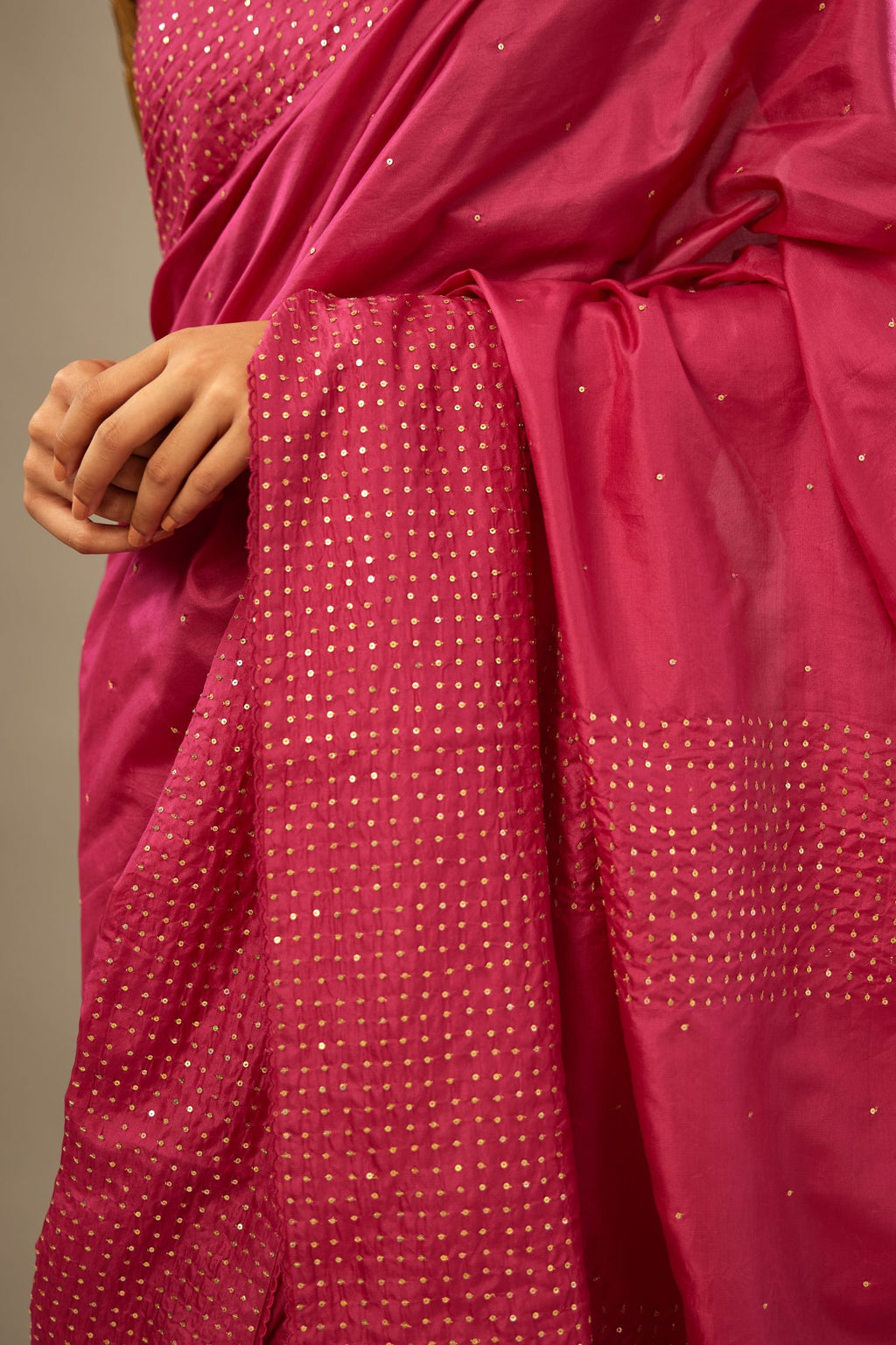 Jazzberry jam silk saree set with a broad border of hand embroidered geometrically aligned sequins and three horizontal bands at the pallu.