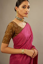 Jazzberry jam silk saree set with a broad border of hand embroidered geometrically aligned sequins and three horizontal bands at the pallu.