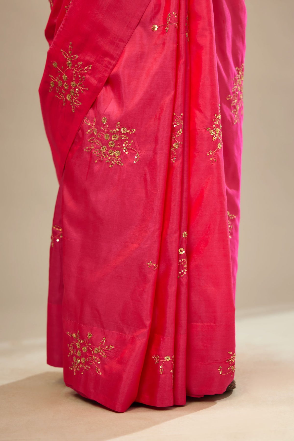 Raspberry silk saree set with hand embroidered delicate sequins floral butas all over.