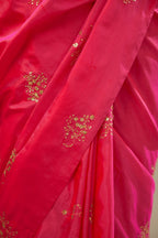 Raspberry silk saree set with hand embroidered delicate sequins floral butas all over.