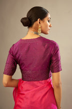 Sangria silk easy fit blouse with a slit neckline and bottom hem have a hand-embroidered geometric sequins band.