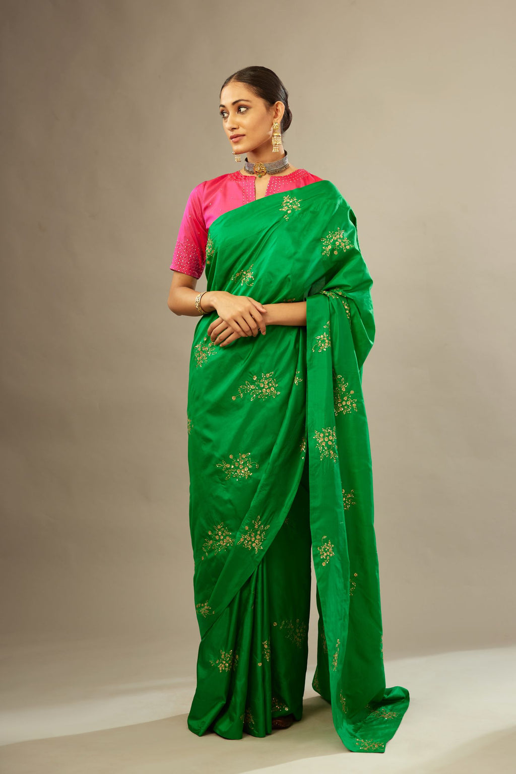 Grass green silk saree set with hand embroidered delicate sequins floral butas all over.