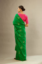 Raspberry silk easy fit blouse with a slit neckline and bottom hem have a hand-embroidered geometric sequins band.