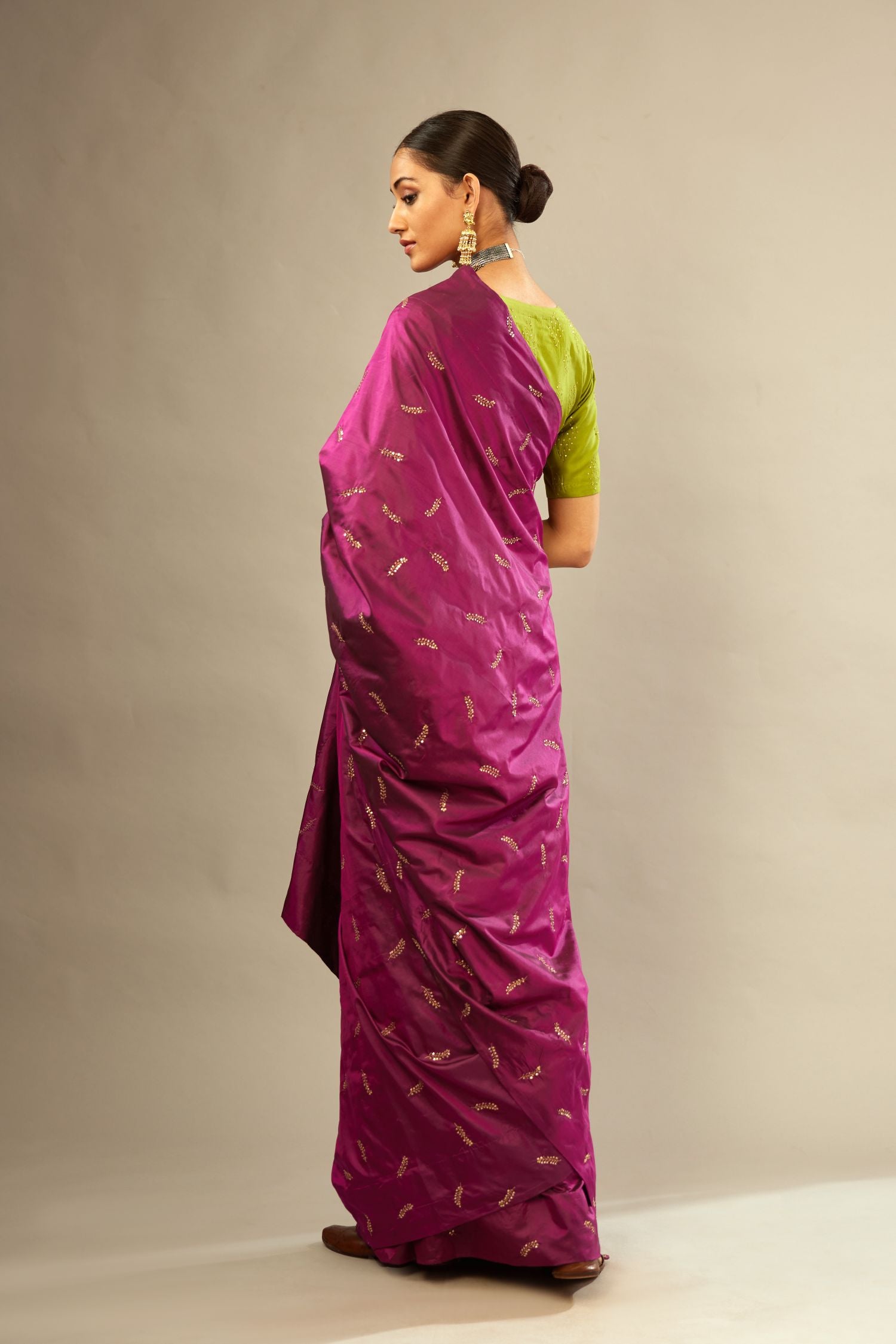 Sangria silk saree set with hand embroidered delicate sequined leaf motifs all over.
