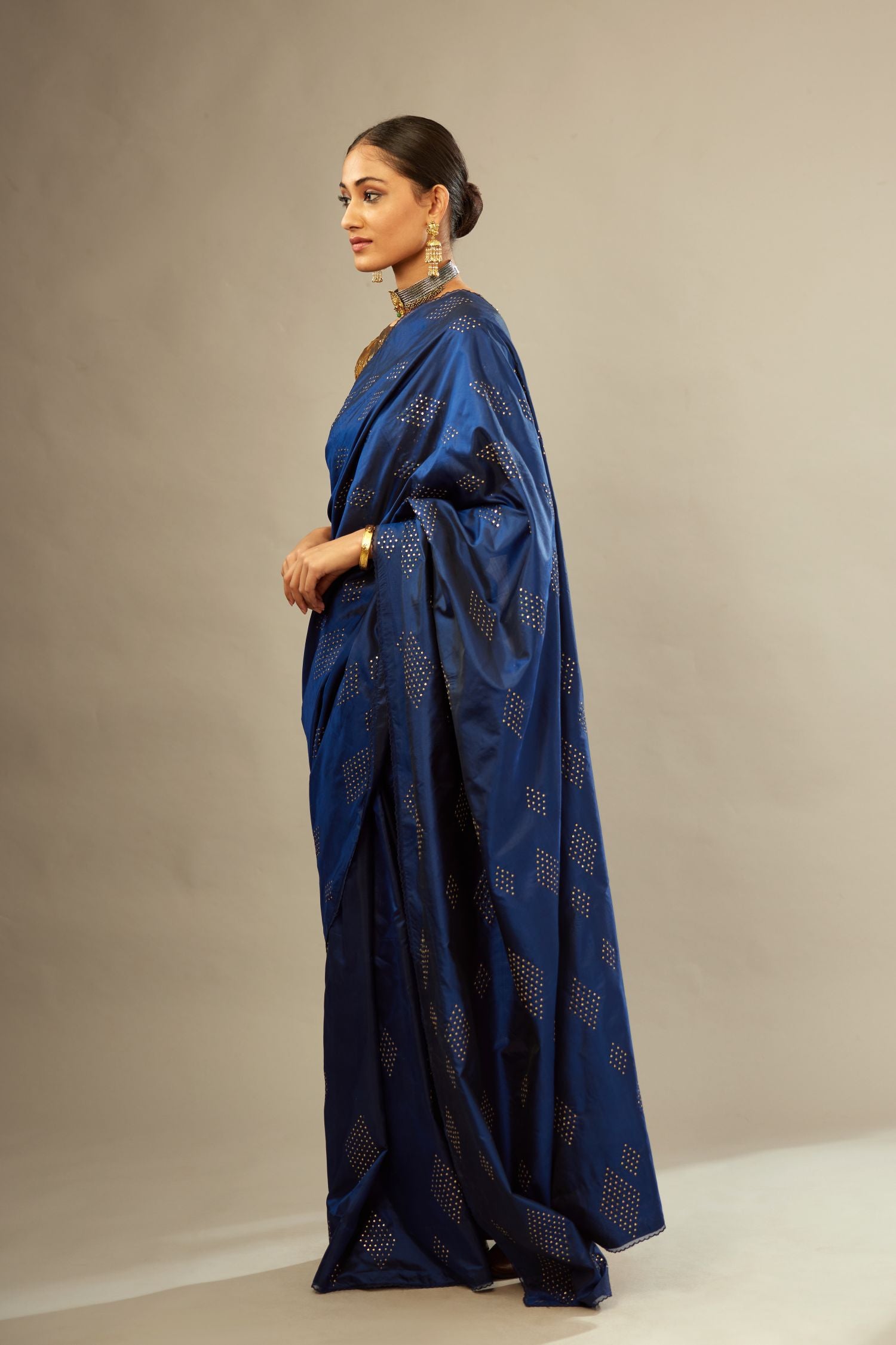 Navy blue silk saree set with all over hand embroidered geometric diamond motifs in sequins