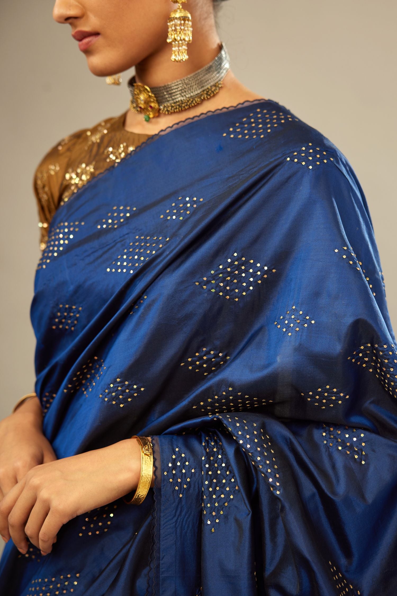 Navy blue silk saree set with all over hand embroidered geometric diamond motifs in sequins