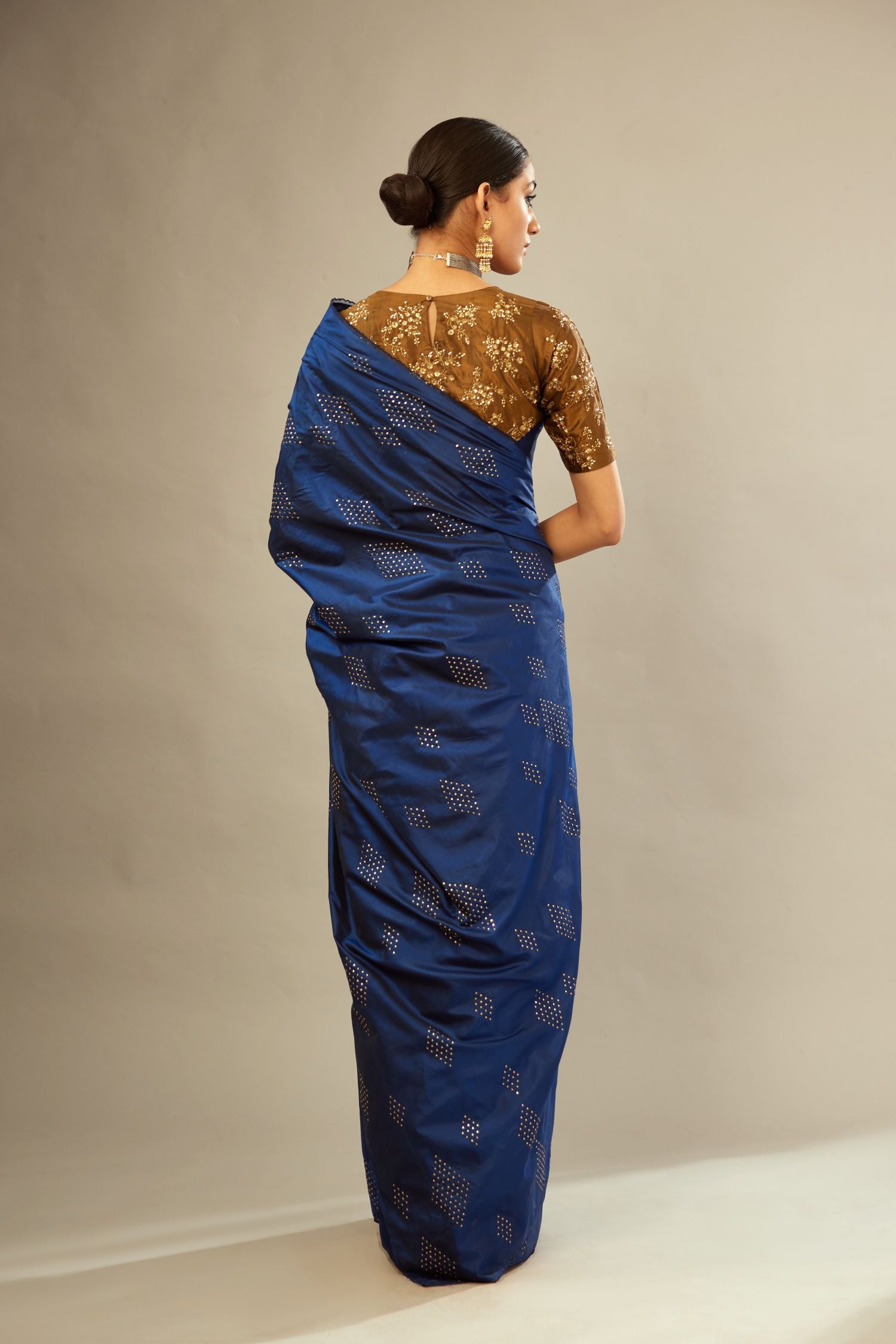 Navy blue silk saree set with all over hand embroidered geometric diamond motifs in sequins