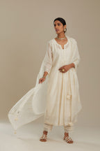 Cotton chanderi Kurta dress set with front gathers and all-over tonal thread embroidery, highlighted with sequins and beads.