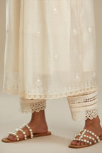 Cotton chanderi Kurta dress set with front gathers and all-over tonal thread embroidery, highlighted with sequins and beads.