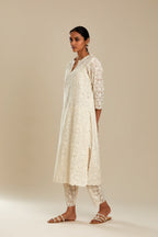 Off white straight kurta set with all-over cotton appliqué trellis jaal, highlighted with sequins.