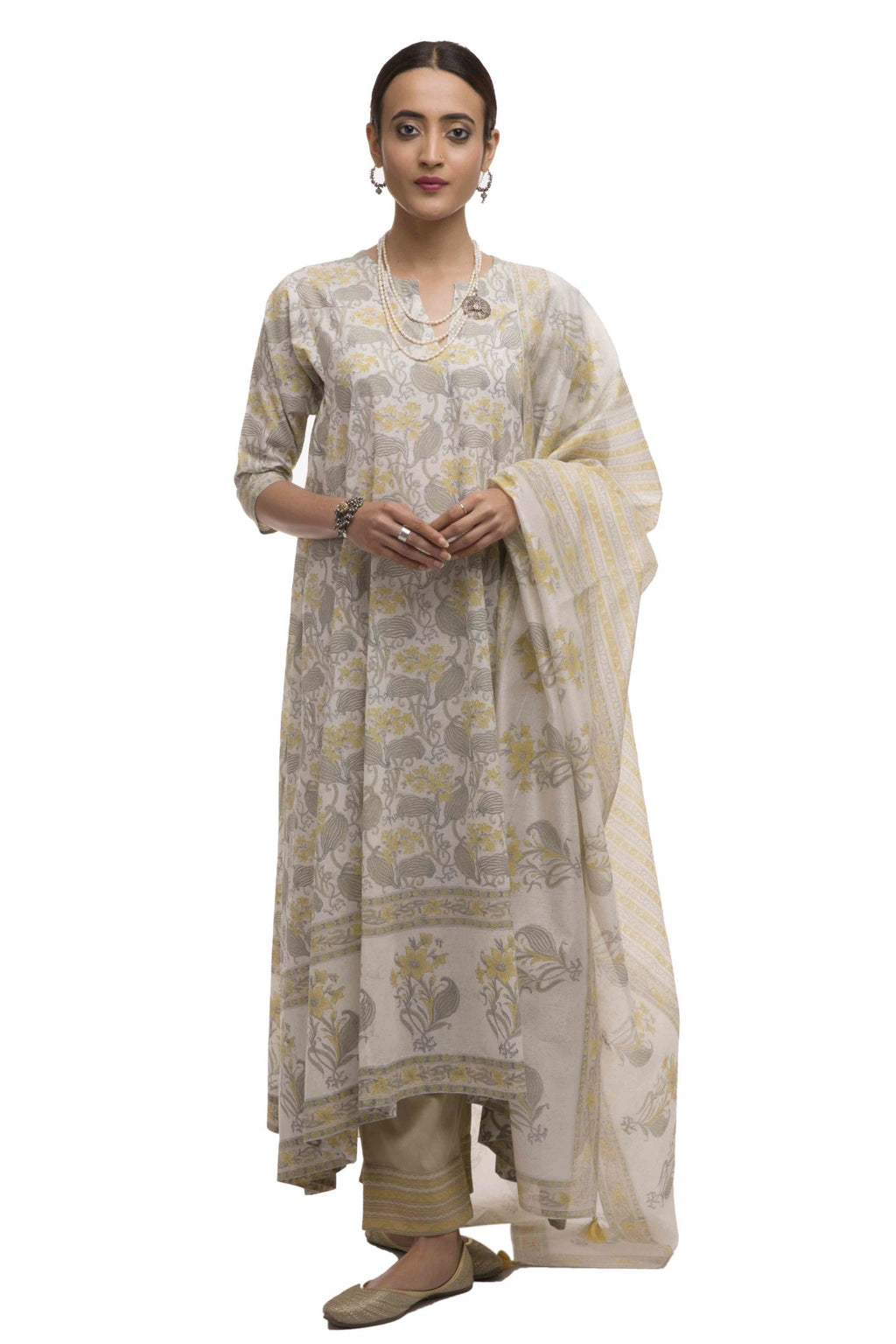 Asymmetric hem kurta with all-over hand block print with broad contrast border print at hem & Straight pant with quilted embroidered hem