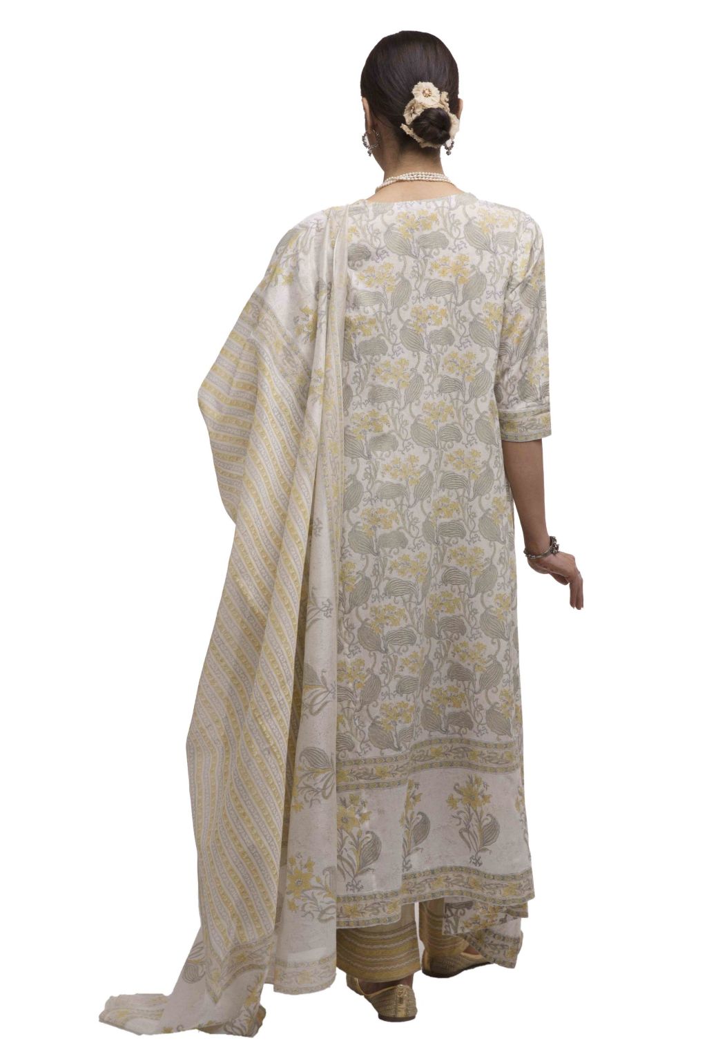 Asymmetric hem kurta with all-over hand block print with broad contrast border print at hem & Straight pant with quilted embroidered hem