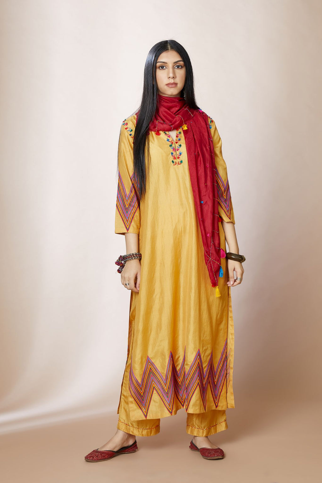 Golden yellow silk straight kurta set with multi thread chevorn embroidery