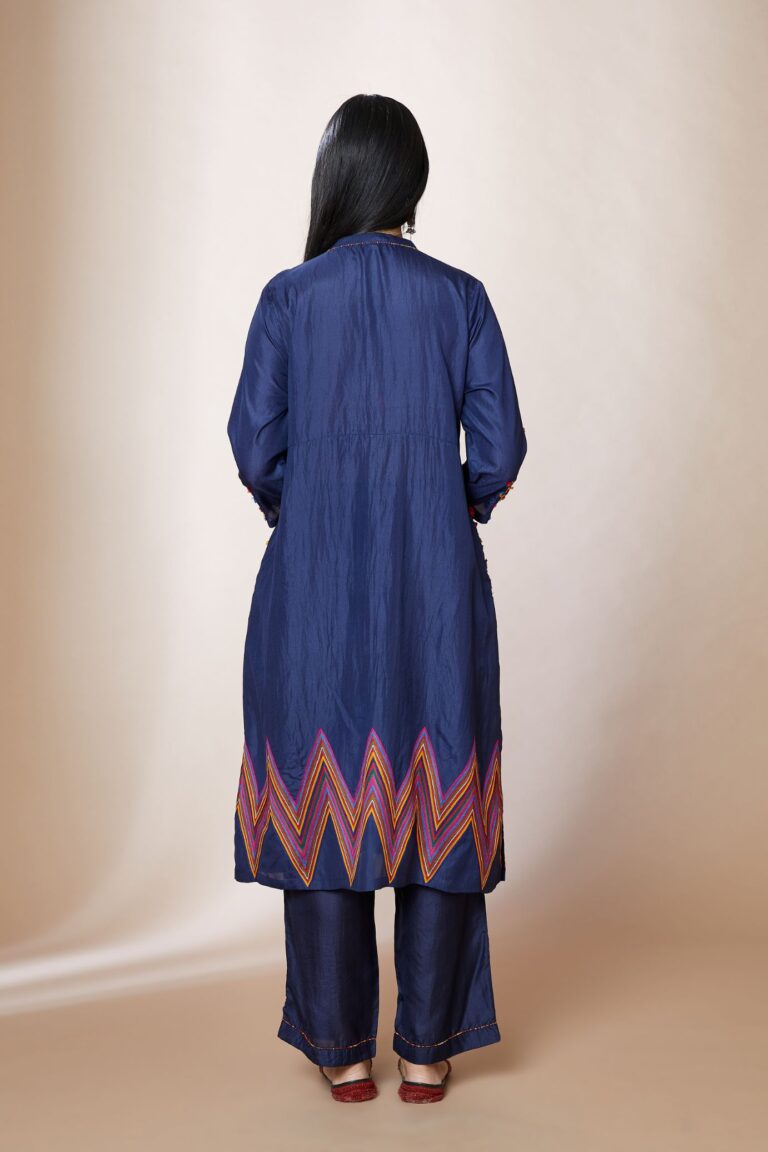 A-line short kurta set with multi coloured chevron embroidery and overlapped neckline