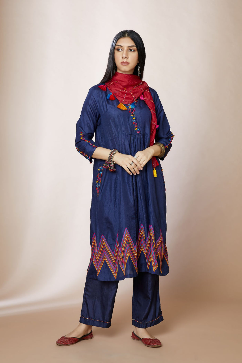 A-line short kurta set with multi coloured chevron embroidery and overlapped neckline