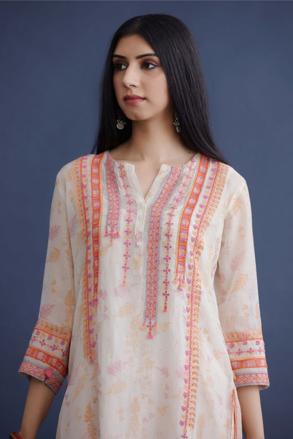 Off white hand block printed short kurta set, highlighted with delicate bead and thread embroidery