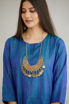 Teal blue hand crushed silk straight kurta set with vertical organza fabric inset stripe detail in front, back and 3/4 sleeves, highlighted with contrasting top stitch.