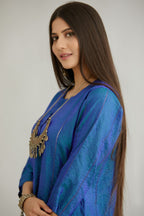 Teal blue hand crushed silk straight kurta set with vertical organza fabric inset stripe detail in front, back and 3/4 sleeves, highlighted with contrasting top stitch.