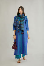 Teal blue hand crushed silk straight kurta set with vertical organza fabric inset stripe detail in front, back and 3/4 sleeves, highlighted with contrasting top stitch.