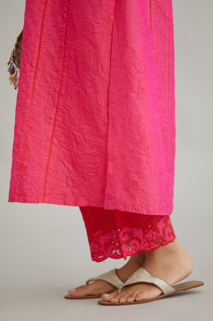 Fuchsia hand crushed silk straight kurta set with vertical organza fabric inset stripe detail in front, back and 3/4 sleeves, highlighted with contrasting top stitch.