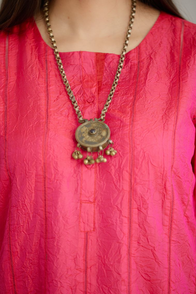 Fuchsia hand crushed silk straight kurta set with vertical organza fabric inset stripe detail in front, back and 3/4 sleeves, highlighted with contrasting top stitch.