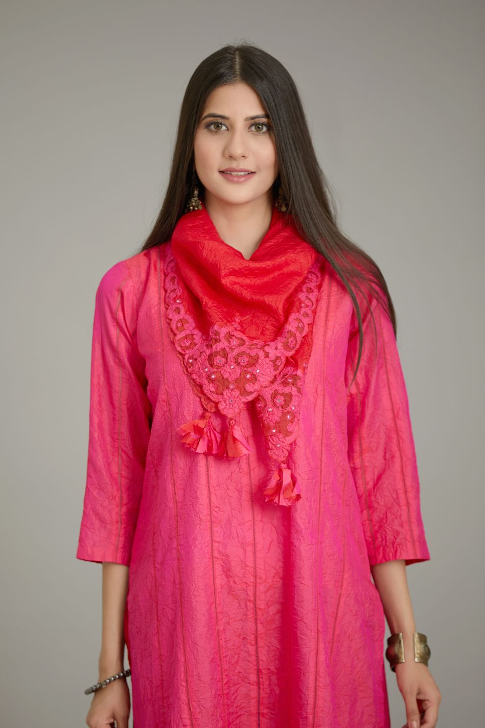 Fuchsia hand crushed silk straight kurta set with vertical organza fabric inset stripe detail in front, back and 3/4 sleeves, highlighted with contrasting top stitch.