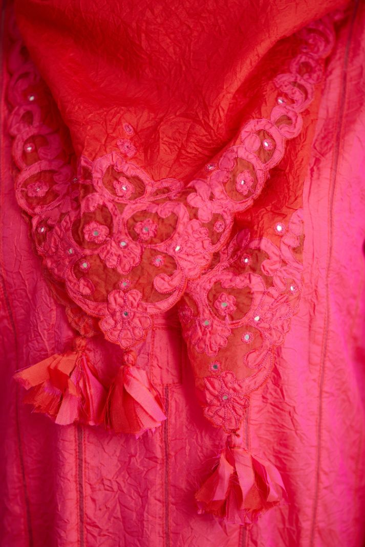 Fuchsia hand crushed silk straight kurta set with vertical organza fabric inset stripe detail in front, back and 3/4 sleeves, highlighted with contrasting top stitch.
