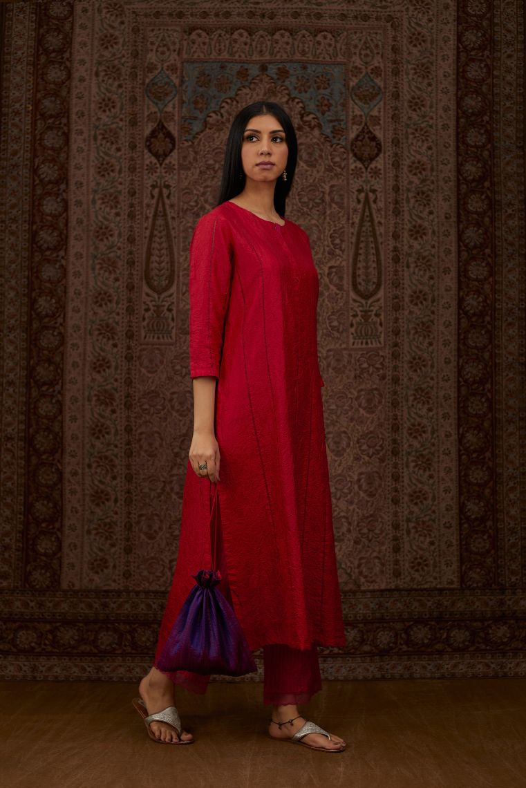 Red hand crushed silk straight kurta set with vertical organza fabric inset stripe detail in front, back and 3/4 sleeves, highlighted with contrasting top stitch.