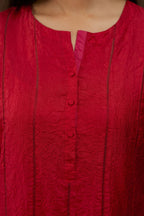 Red hand crushed silk straight kurta set with vertical organza fabric inset stripe detail in front, back and 3/4 sleeves, highlighted with contrasting top stitch.