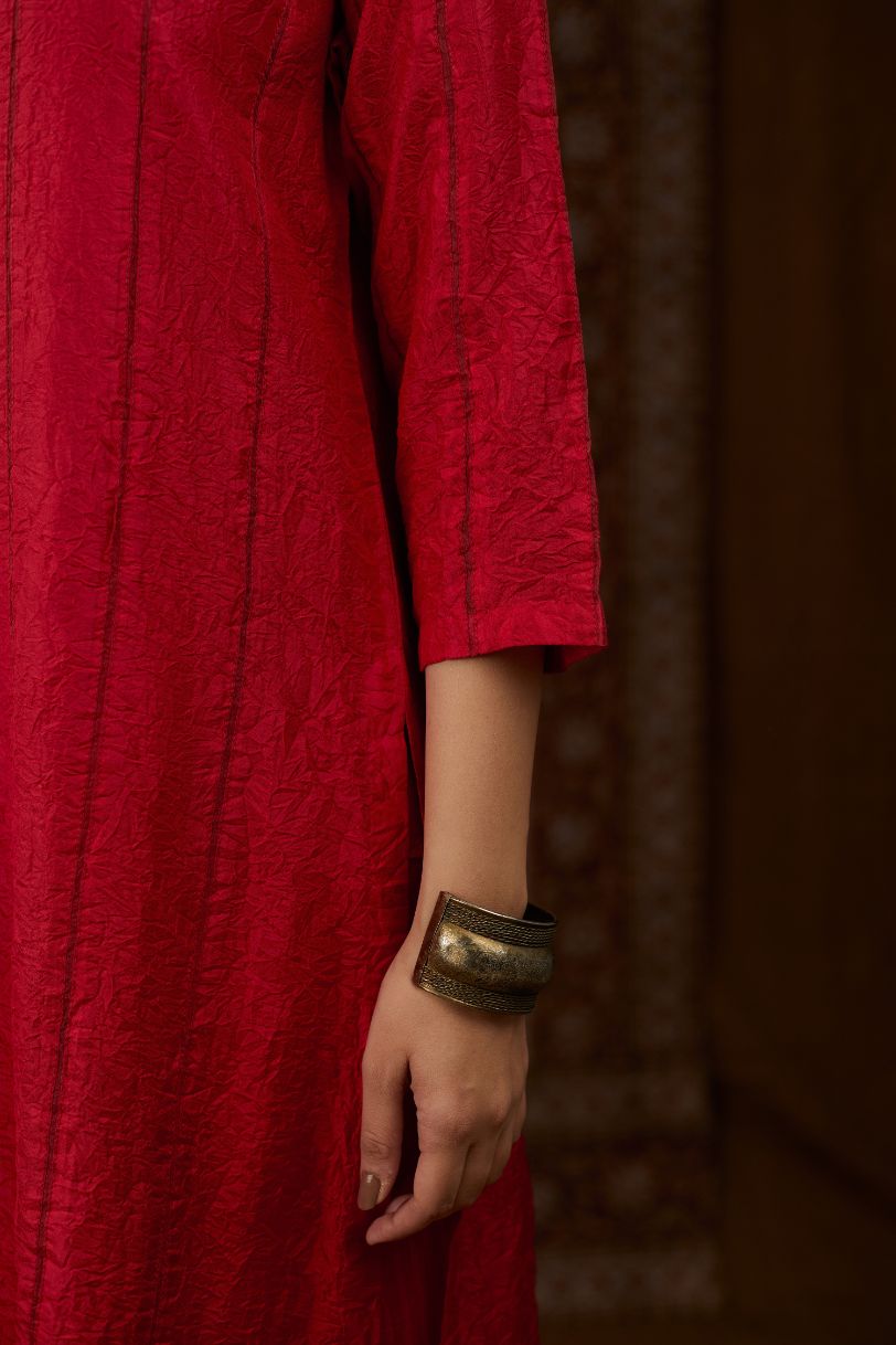 Red hand crushed silk straight kurta set with vertical organza fabric inset stripe detail in front, back and 3/4 sleeves, highlighted with contrasting top stitch.