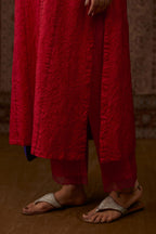 Red hand crushed silk straight kurta set with vertical organza fabric inset stripe detail in front, back and 3/4 sleeves, highlighted with contrasting top stitch.