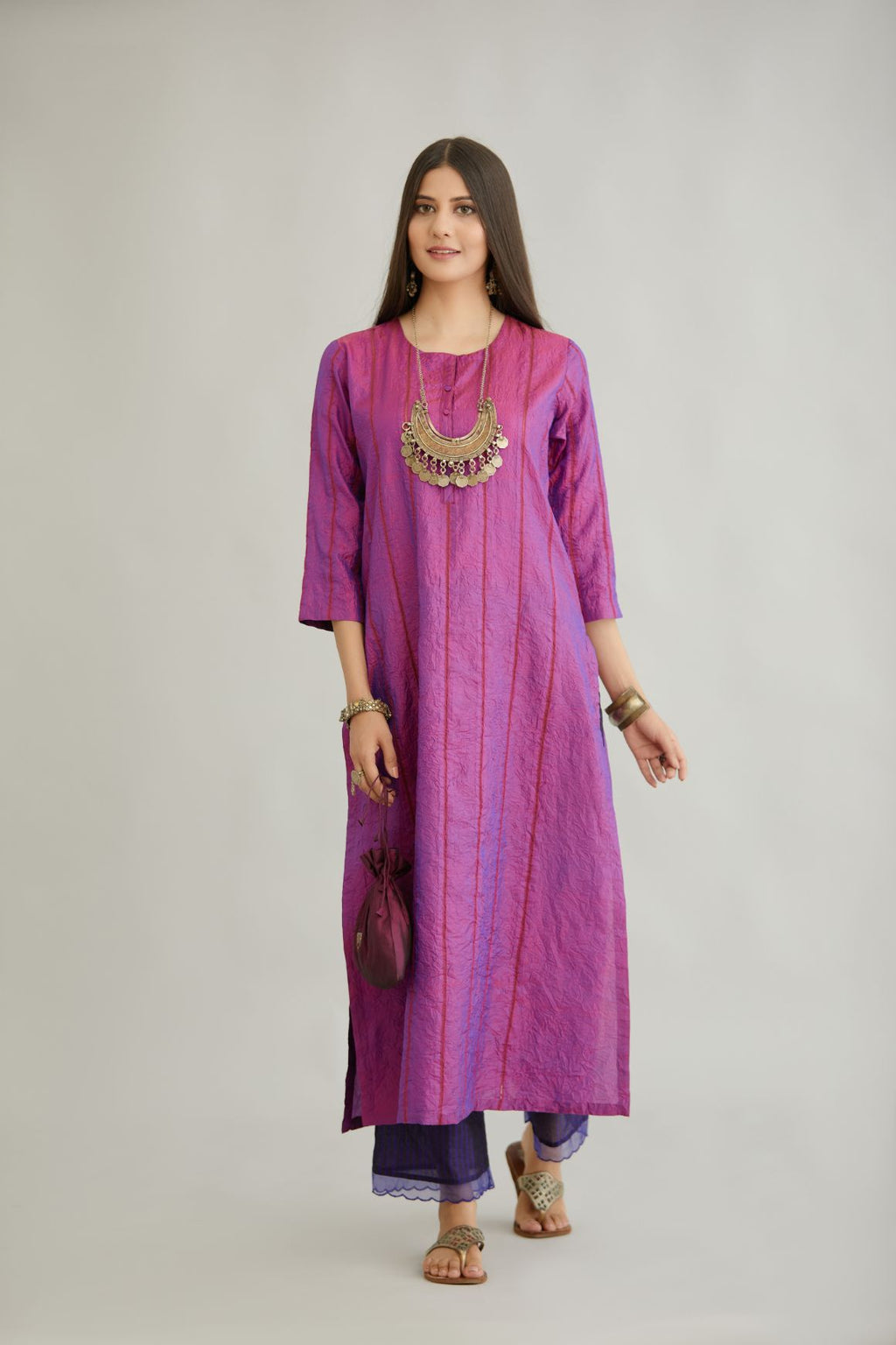 Purple hand crushed silk straight kurta set with vertical organza fabric inset stripe detail in front, back and 3/4 sleeves, highlighted with contrasting top stitch.