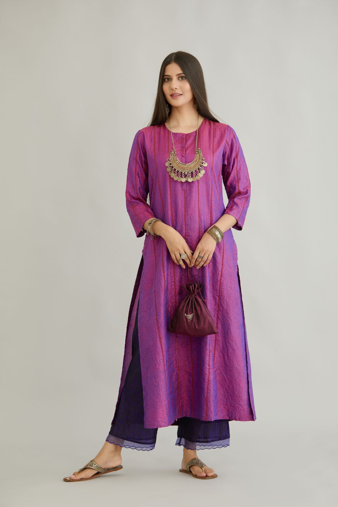 Purple hand crushed silk straight kurta set with vertical organza fabric inset stripe detail in front, back and 3/4 sleeves, highlighted with contrasting top stitch.