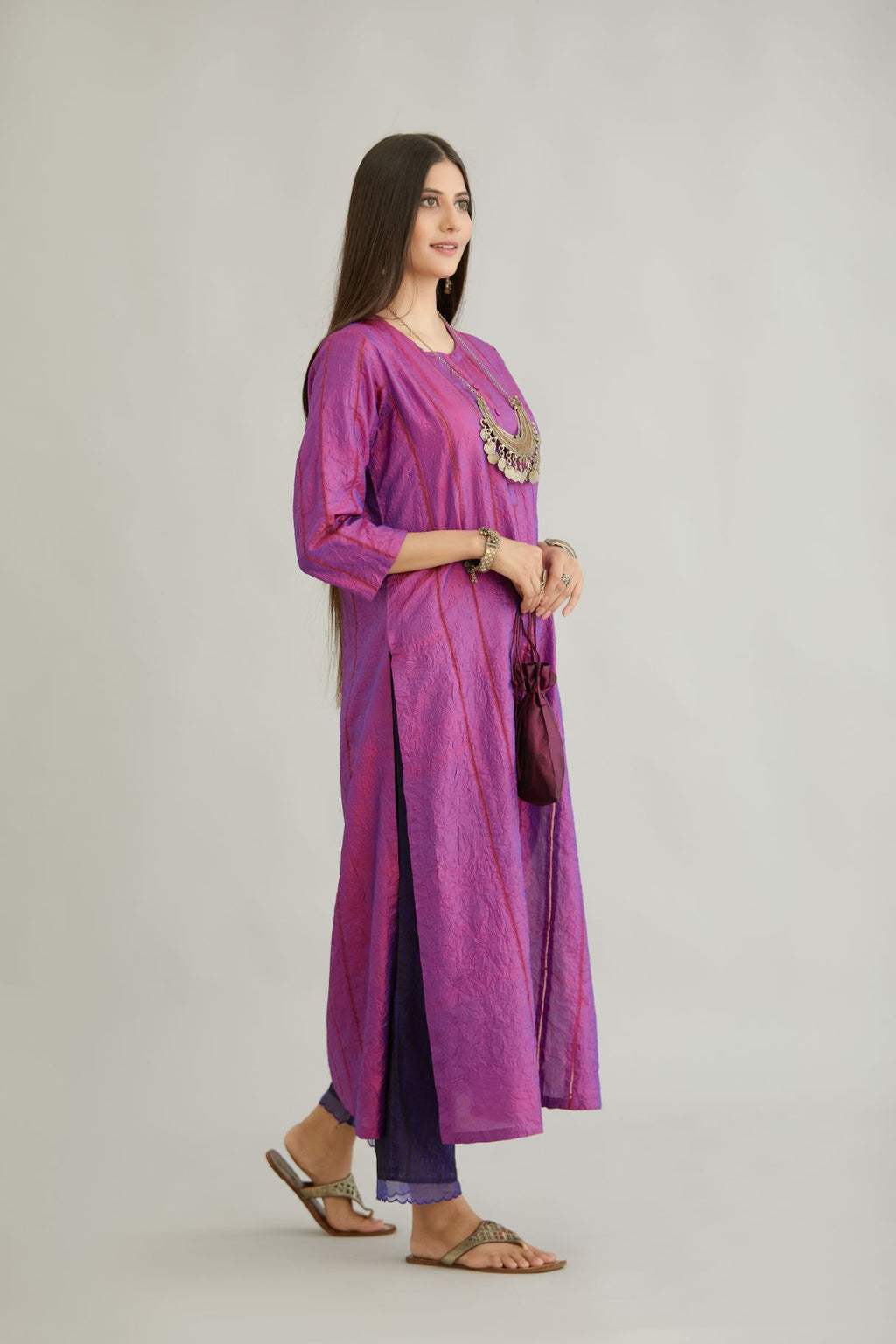 Purple hand crushed silk straight kurta set with vertical organza fabric inset stripe detail in front, back and 3/4 sleeves, highlighted with contrasting top stitch.