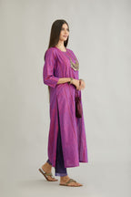 Purple hand crushed silk straight kurta set with vertical organza fabric inset stripe detail in front, back and 3/4 sleeves, highlighted with contrasting top stitch.