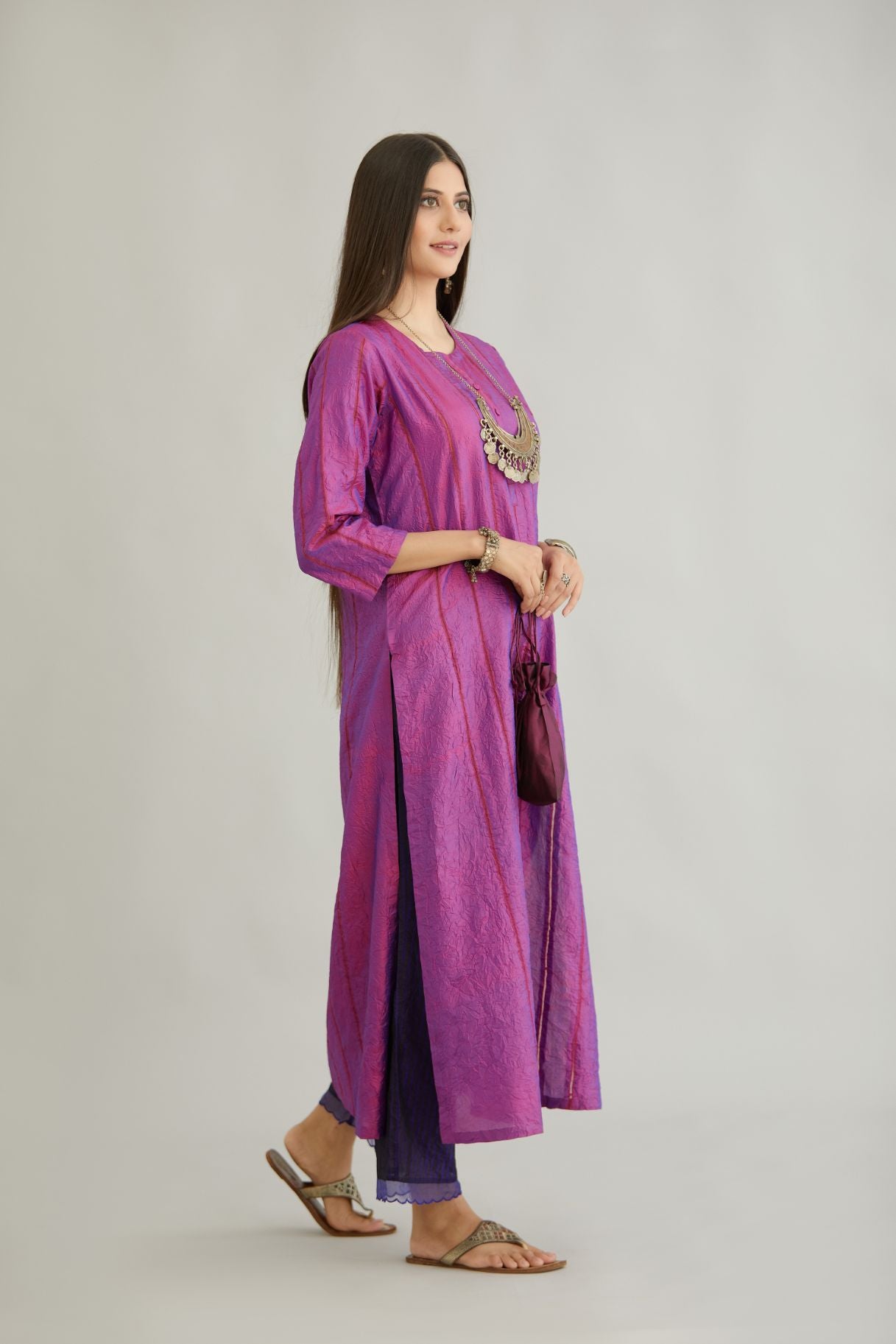 Purple hand crushed silk straight kurta set with vertical organza fabric inset stripe detail in front, back and 3/4 sleeves, highlighted with contrasting top stitch.