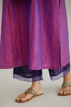 Purple hand crushed silk straight kurta set with vertical organza fabric inset stripe detail in front, back and 3/4 sleeves, highlighted with contrasting top stitch.