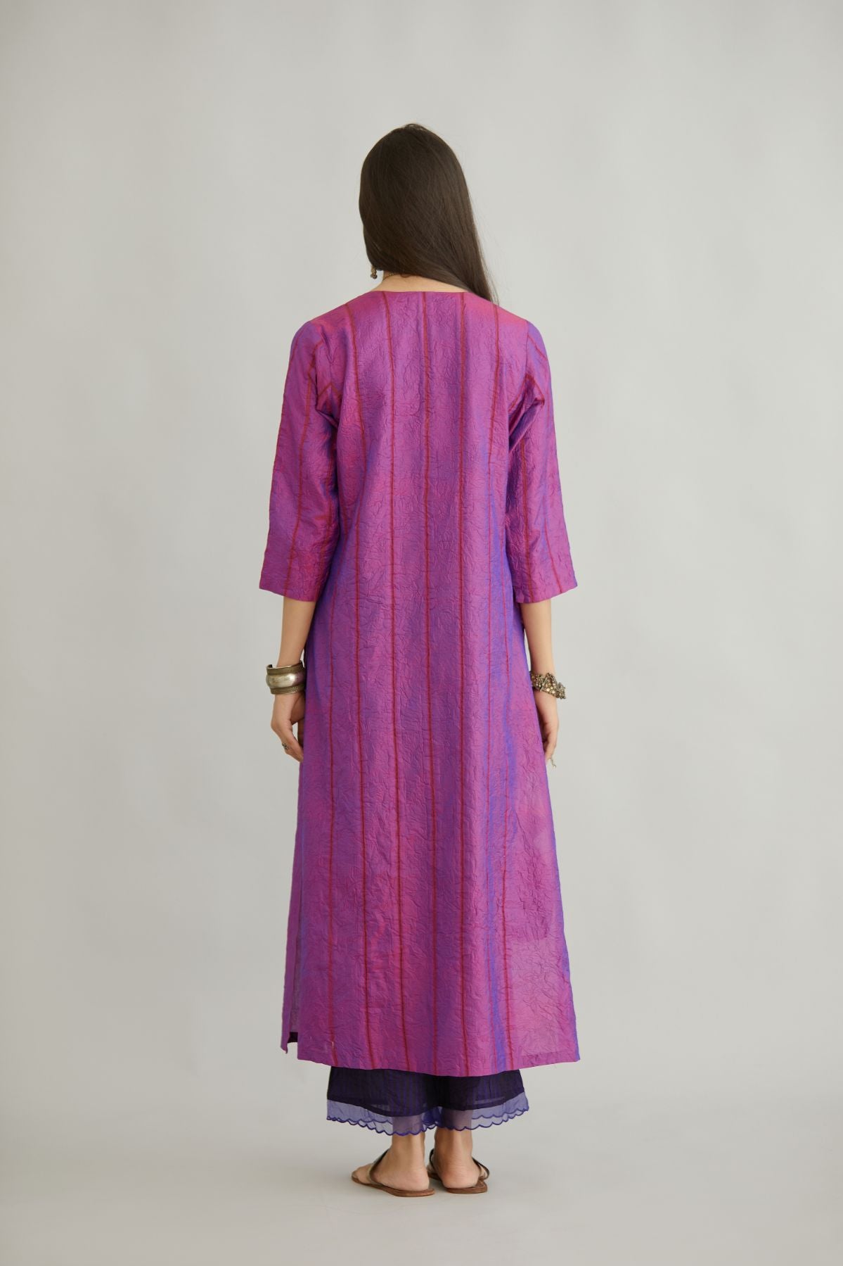 Purple hand crushed silk straight kurta set with vertical organza fabric inset stripe detail in front, back and 3/4 sleeves, highlighted with contrasting top stitch.