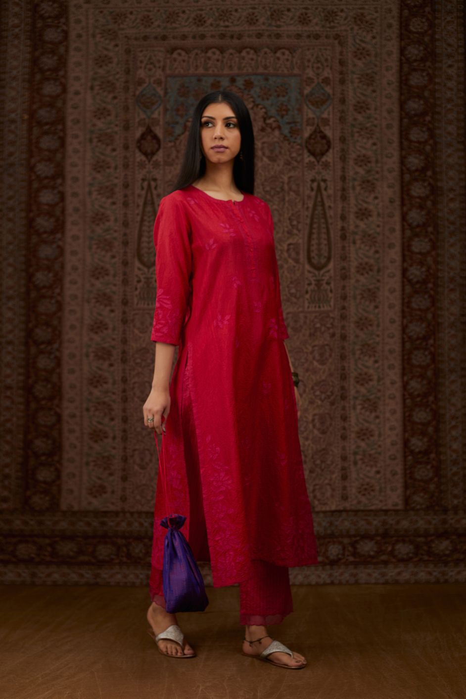 Red hand crushed silk kurta set with all-over contrast silk fabric applique work and embroidered button placket neckline.