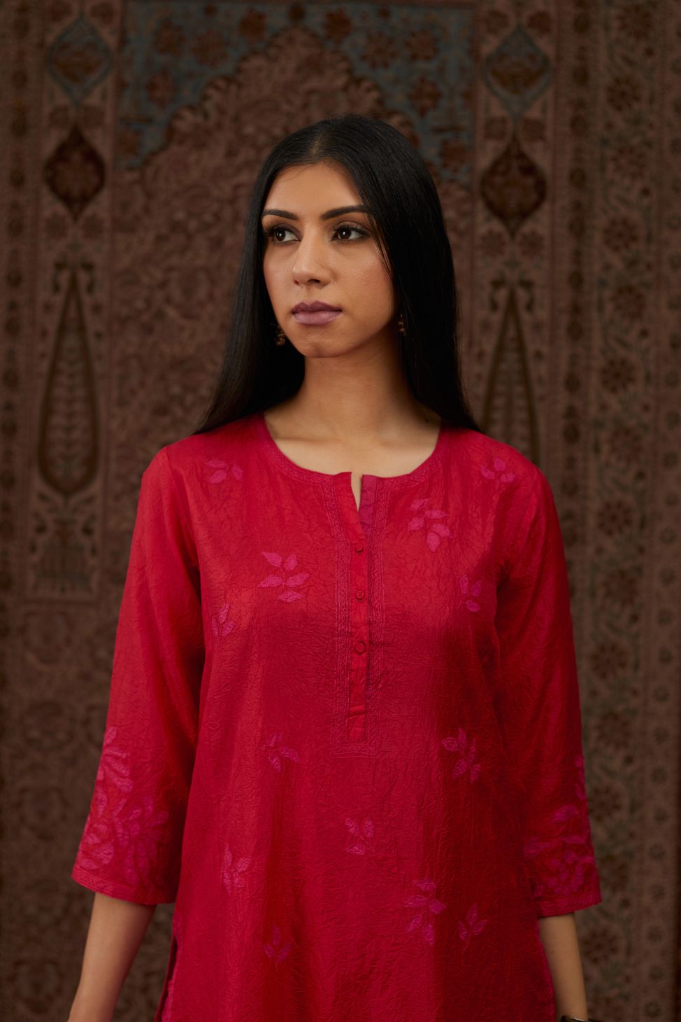 Red hand crushed silk kurta set with all-over contrast silk fabric applique work and embroidered button placket neckline.