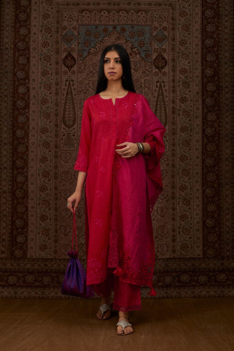 Red hand crushed silk kurta set with all-over contrast silk fabric applique work and embroidered button placket neckline.
