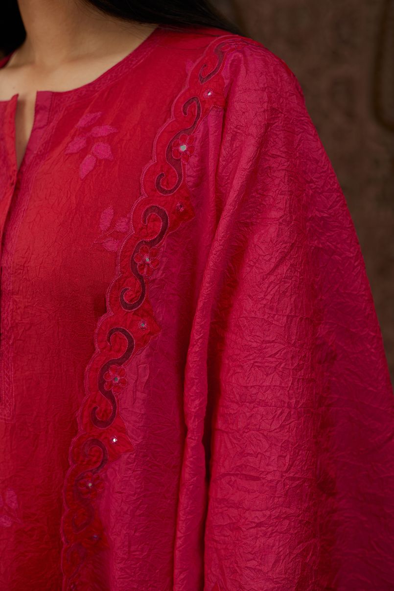 Red hand crushed silk kurta set with all-over contrast silk fabric applique work and embroidered button placket neckline.